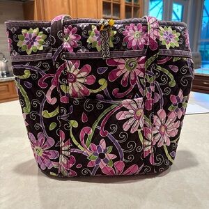 Very gently used Vera Bradley tote. Front & Back pockets. 6 pockets inside.
